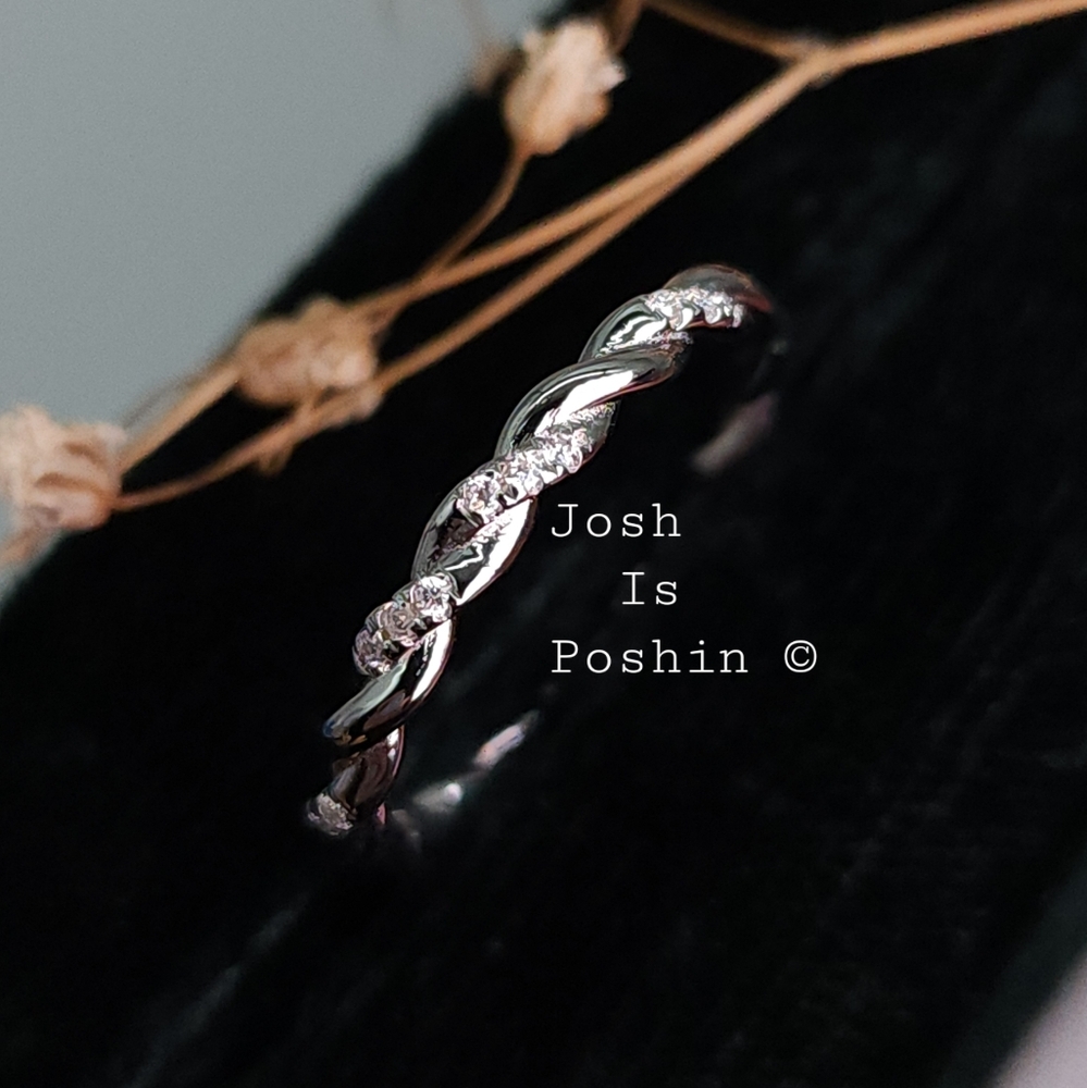 0.08ctw twist moissanite ring in sterling silver